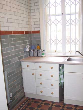 view of cloak room and toilet